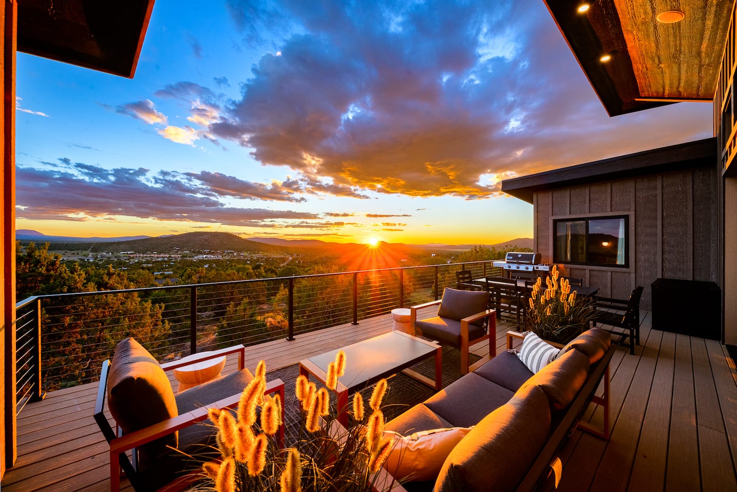 Deck lounge seating at sunset